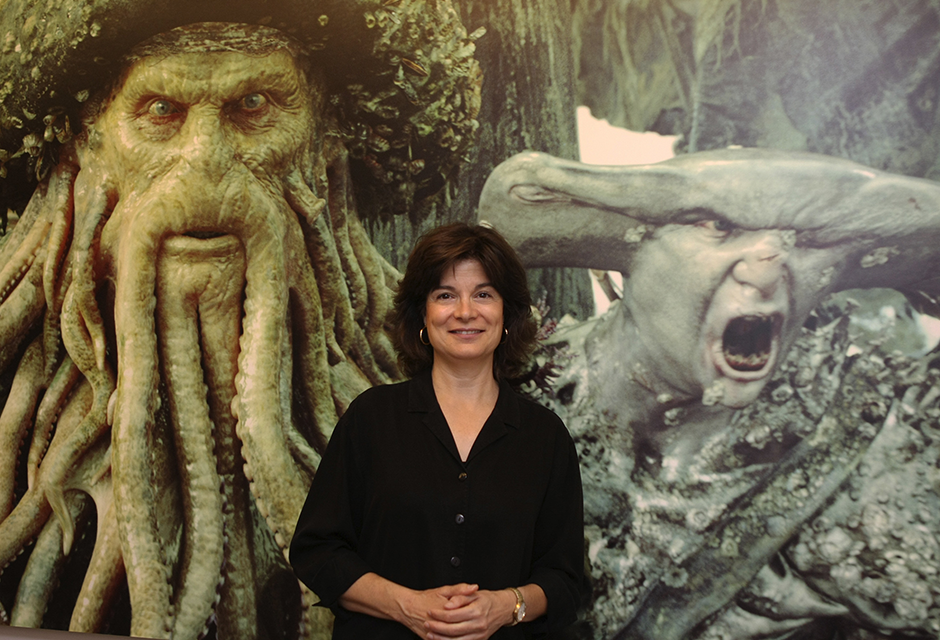 Carolyn Porco posing with alien creatures at Industrial Light & Magic, 2008