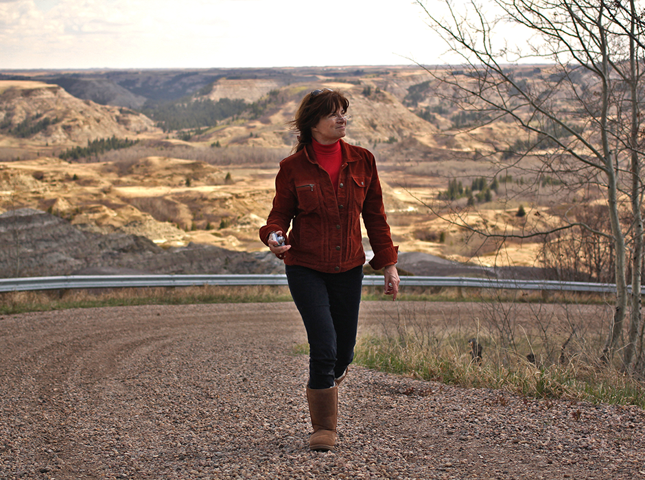 Carolyn Porco visiting the KT boundary in southern Alberta, Canada, 2014.